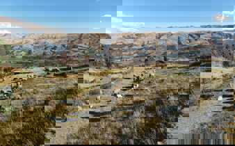 Traditional farming scene in Peru's Sacred Valley, set against the Andean highlands. 